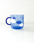 Blue colored glass cup - clouds pattern